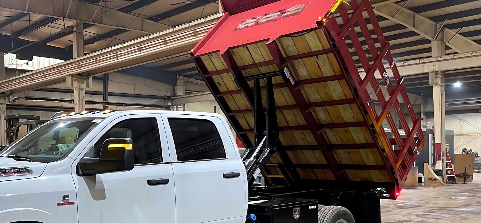Red Stake Body Dump Truck