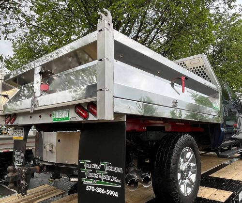 Photo of aluminum body on steel subframe and chassis.